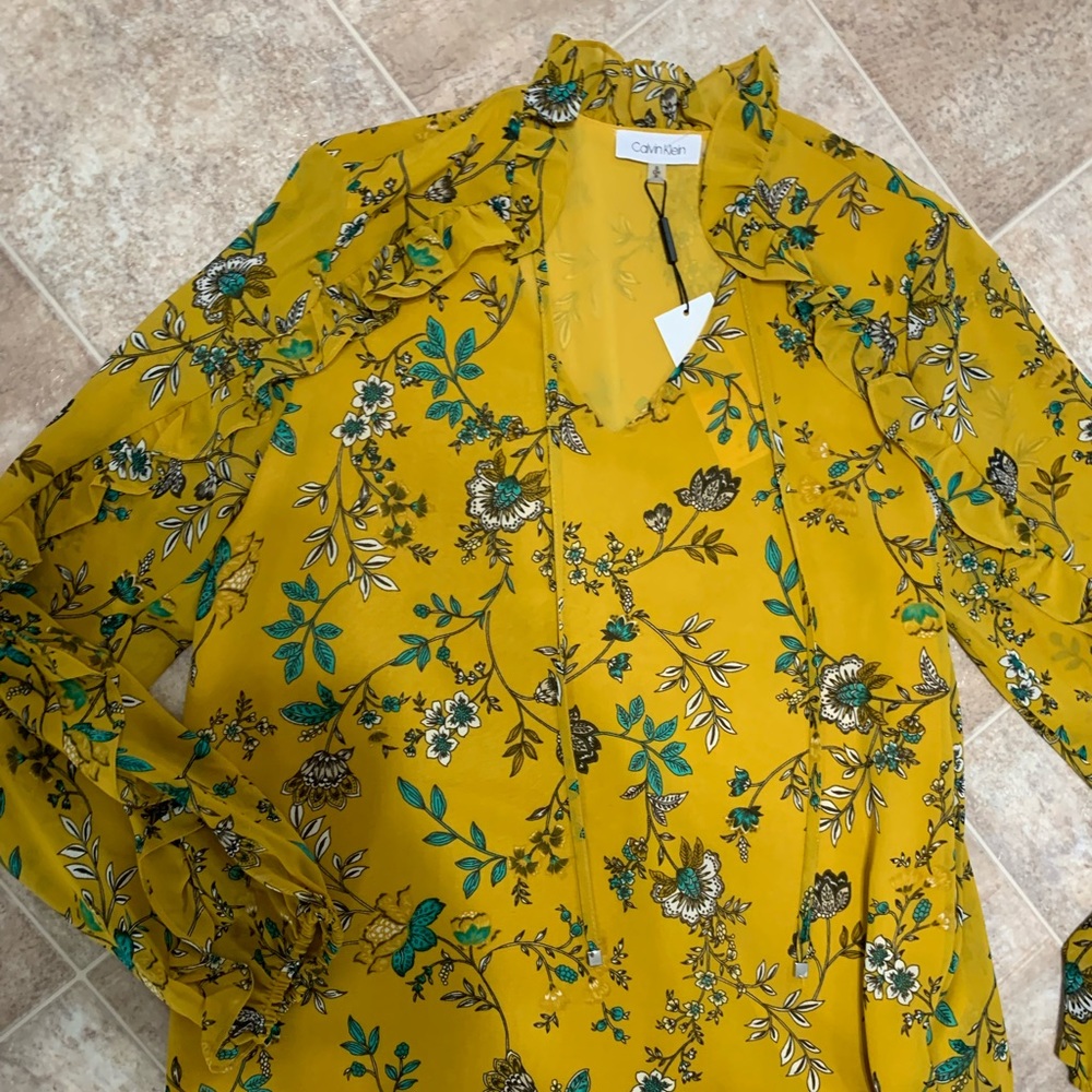 Long sleeved Calvin Klein sheer shirt